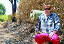 Close shave for family Paul Reynolds on the scorched front boundary of his Reynolds Road property, just metres from his house.