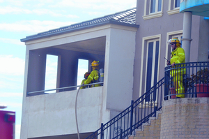 A cigarette butt caused a balcony fire in Beaconsfield on Thursday