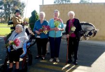 Saying Happy Mother’s Day with flowers
