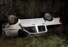 Driver trapped under ditch crash car