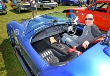 Classic cars cruise in