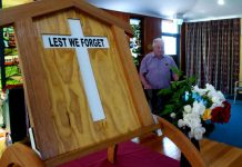 Residents conduct solemn service