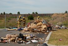 Truck driver dumps fiery load