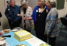 Red rose blooms for club friendship