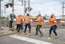 Last boom gates down at Webster Street