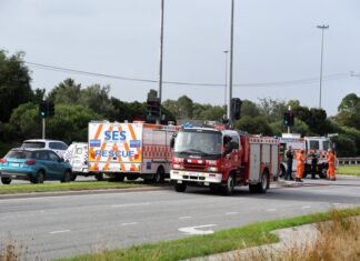 Emergency crews rescue person trapped in vehicle